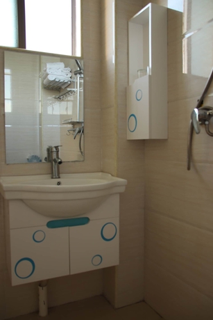 Imagen de la habitación del Hotel Muhai Guesthouse. Foto 13