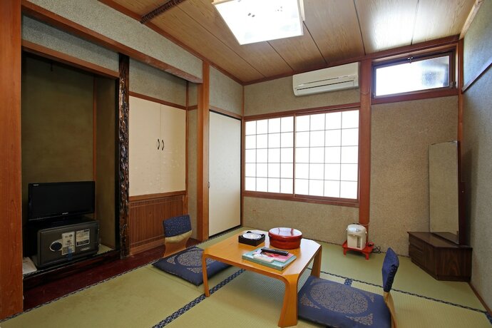 Imagen de la habitación del Hotel Muhyoukan. Foto 11