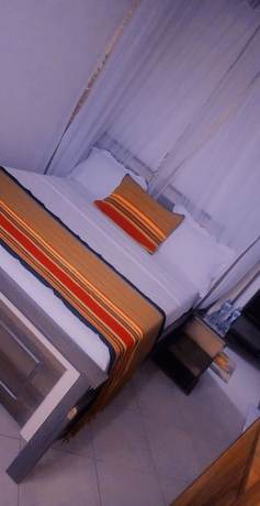 Imagen de la habitación del Hotel Mujjo. Foto 16