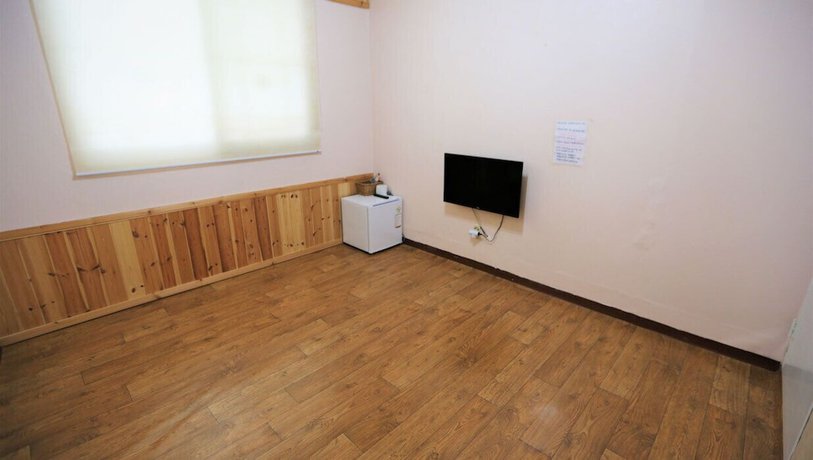 Imagen de la habitación del Hotel Muju Bakam Villa Pension. Foto 3
