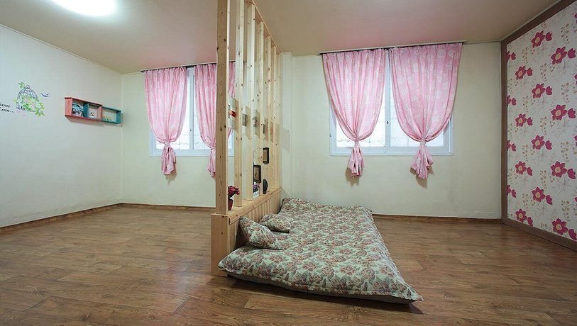 Imagen de la habitación del Hotel Muju Bakam Villa Pension. Foto 6