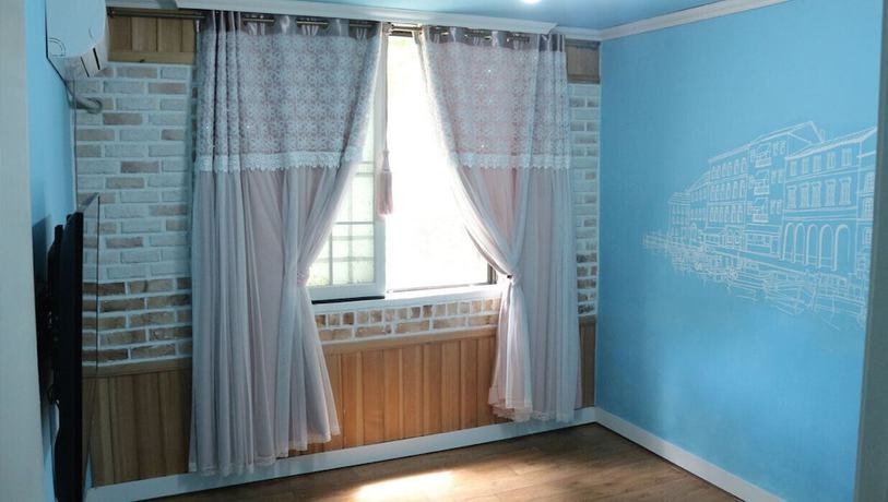 Imagen de la habitación del Hotel Muju Bakam Villa Pension. Foto 7