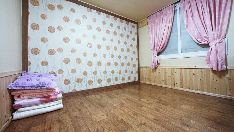 Imagen de la habitación del Hotel Muju Bakam Villa Pension. Foto 11