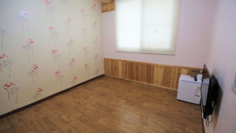 Imagen de la habitación del Hotel Muju Bakam Villa Pension. Foto 12