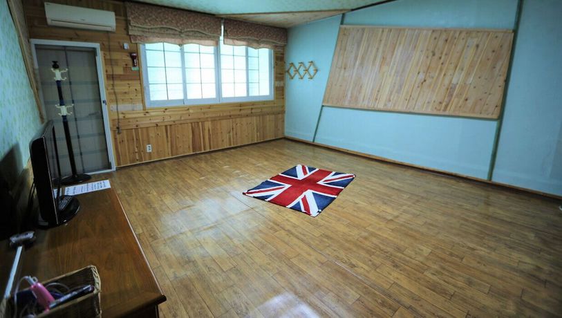 Imagen de la habitación del Hotel Muju Bakam Villa Pension. Foto 13