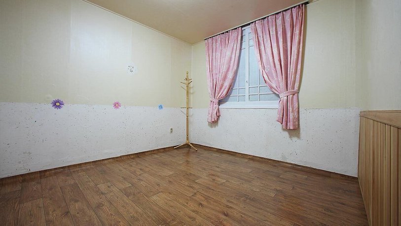 Imagen de la habitación del Hotel Muju Bakam Villa Pension. Foto 19