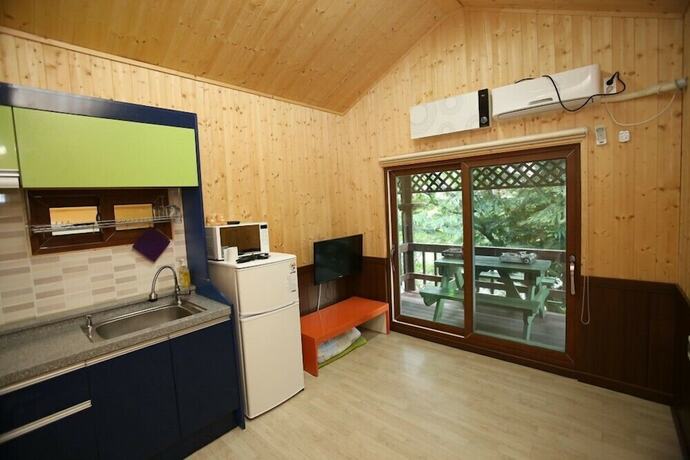 Imagen de la habitación del Hotel Muju Caravan Pesnion. Foto 18