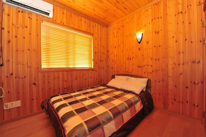 Imagen de la habitación del Hotel Muju Ecoville. Foto 8