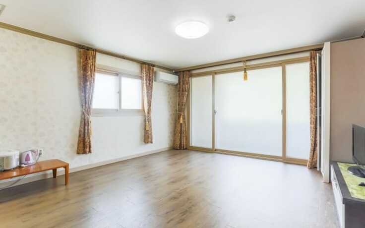 Imagen de la habitación del Hotel Muju Rainbow Pension. Foto 11