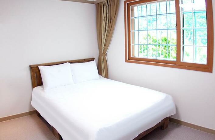 Imagen de la habitación del Hotel Muju Resortel. Foto 19