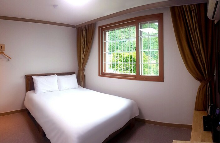 Imagen de la habitación del Hotel Muju Resortel. Foto 20