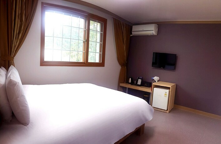 Imagen de la habitación del Hotel Muju Resortel. Foto 29