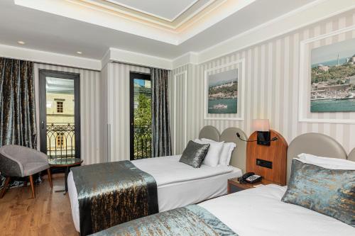 Imagen de la habitación del Hotel Mukarnas Pera. Foto 13