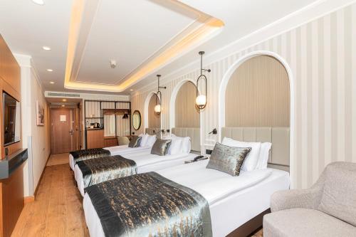 Imagen de la habitación del Hotel Mukarnas Pera. Foto 14