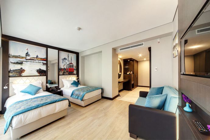 Imagen de la habitación del Hotel Mukarnas Taksim. Foto 12