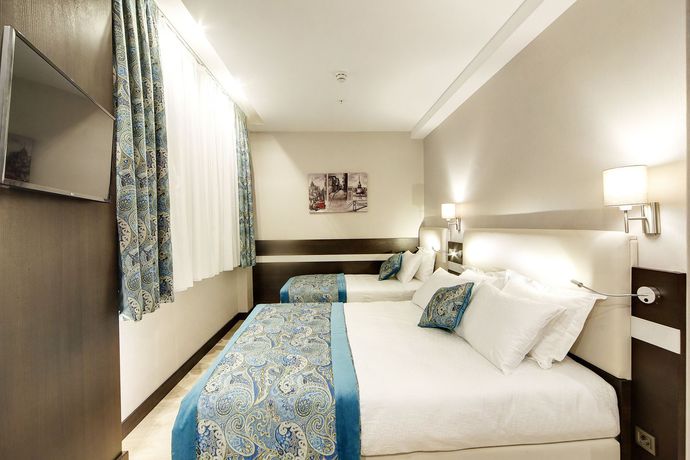 Imagen de la habitación del Hotel Mukarnas Taksim. Foto 14