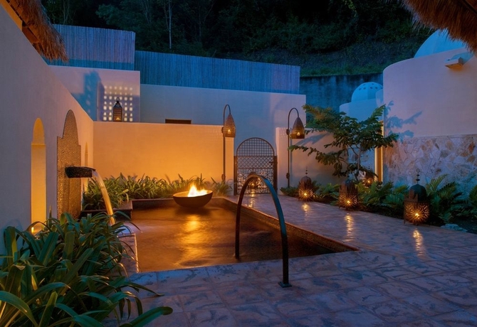 Imagen de la piscina del Hotel Mukul Beach Golf and Spa. Foto 13