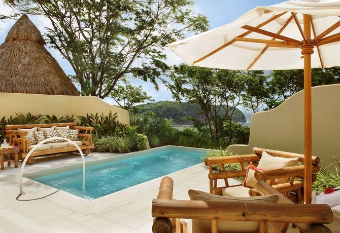 Imagen de la piscina del Hotel Mukul Beach Golf and Spa. Foto 14