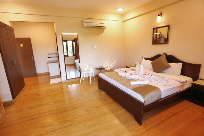 Imagen de la habitación del Hotel Mulberry Araliayas Resort and Spa. Foto 16
