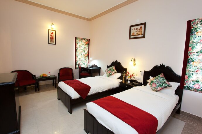 Imagen de la habitación del Hotel Mulberry Araliayas Resort and Spa. Foto 20