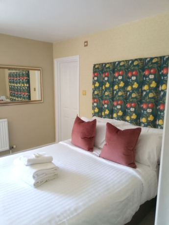 Imagen de la habitación del Hotel Mulberry House. Foto 12