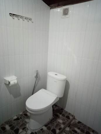 Imagen de la habitación del Hotel Mulia Home Stay. Foto 21