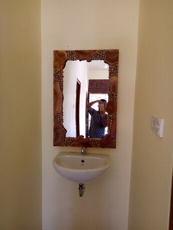 Imagen de la habitación del Hotel Mulia Home Stay. Foto 22