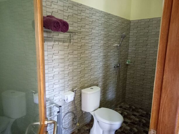 Imagen de la habitación del Hotel Mulia Home Stay. Foto 23
