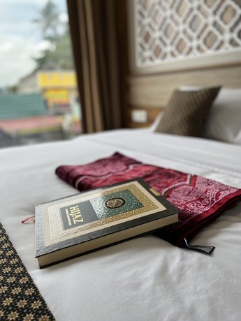 Imagen de la habitación del Hotel Mulia Syariah. Foto 6
