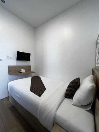 Imagen de la habitación del Hotel Mulia Syariah. Foto 9