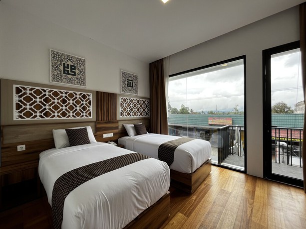 Imagen de la habitación del Hotel Mulia Syariah. Foto 11