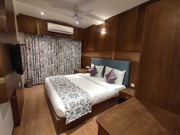Imagen de la habitación del Hotel Mumbai House Express. Foto 7