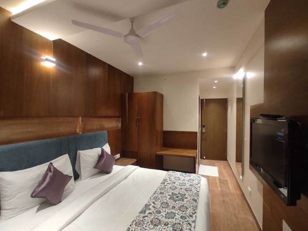 Imagen de la habitación del Hotel Mumbai House Express. Foto 8