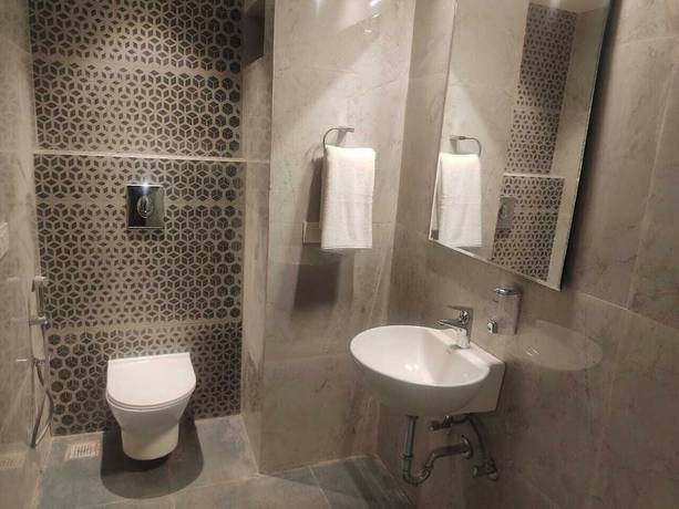 Imagen de la habitación del Hotel Mumbai House Express. Foto 9
