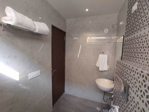Imagen de la habitación del Hotel Mumbai House Express. Foto 10