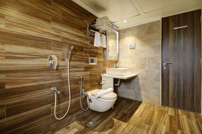 Imagen de la habitación del Hotel Mumbai House Juhu. Foto 9