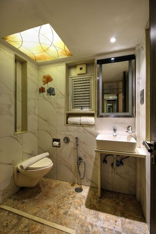 Imagen de la habitación del Hotel Mumbai House Juhu. Foto 13