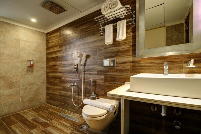 Imagen de la habitación del Hotel Mumbai House Juhu. Foto 14