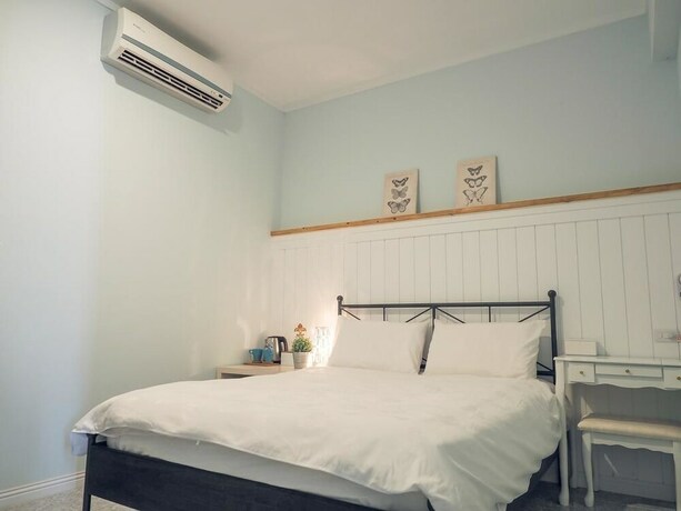 Imagen de la habitación del Hotel Mumu Inn. Foto 17