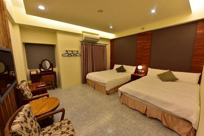 Imagen de la habitación del Hotel Mumu Inn. Foto 26