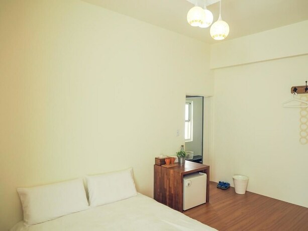 Imagen de la habitación del Hotel Mumu Inn. Foto 27