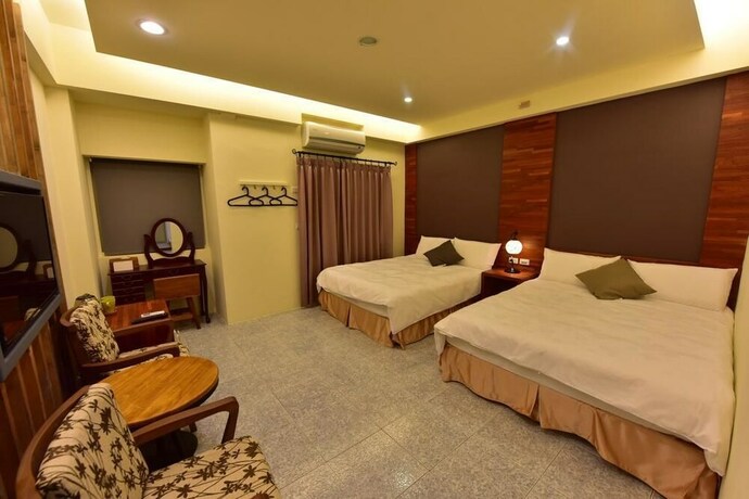 Imagen de la habitación del Hotel Mumu Inn. Foto 28