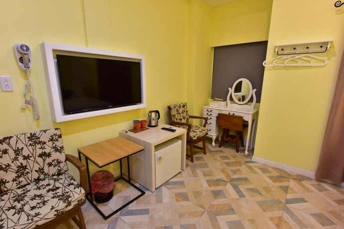 Imagen de la habitación del Hotel Mumu Inn. Foto 33