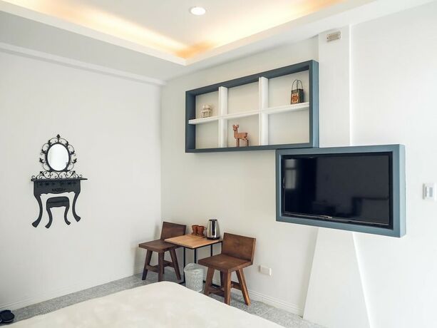 Imagen de la habitación del Hotel Mumu Inn. Foto 37