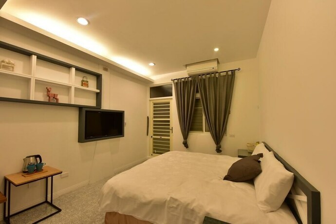 Imagen de la habitación del Hotel Mumu Inn, Hengchun. Foto 15