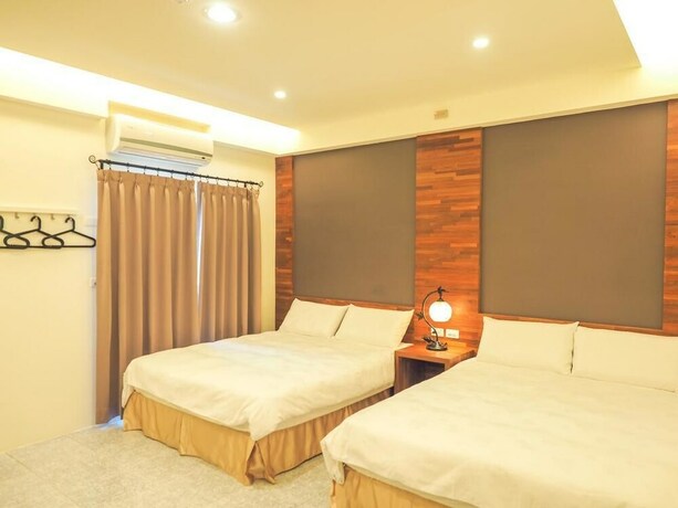 Imagen de la habitación del Hotel Mumu Inn, Hengchun. Foto 16