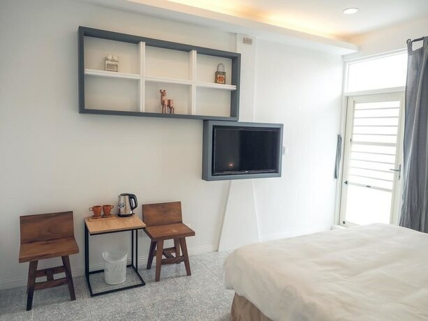 Imagen de la habitación del Hotel Mumu Inn, Hengchun. Foto 18