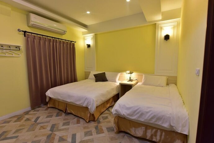 Imagen de la habitación del Hotel Mumu Inn, Hengchun. Foto 25