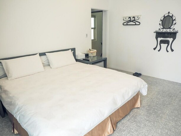 Imagen de la habitación del Hotel Mumu Inn, Hengchun. Foto 32