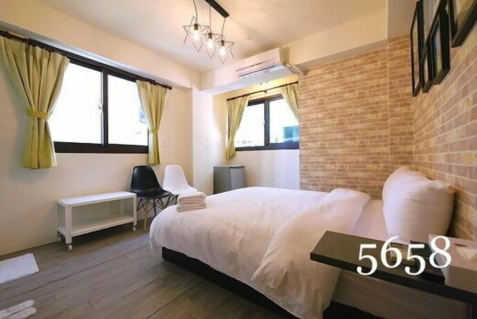 Imagen de la habitación del Hotel Mumu Inn, Taichung. Foto 16